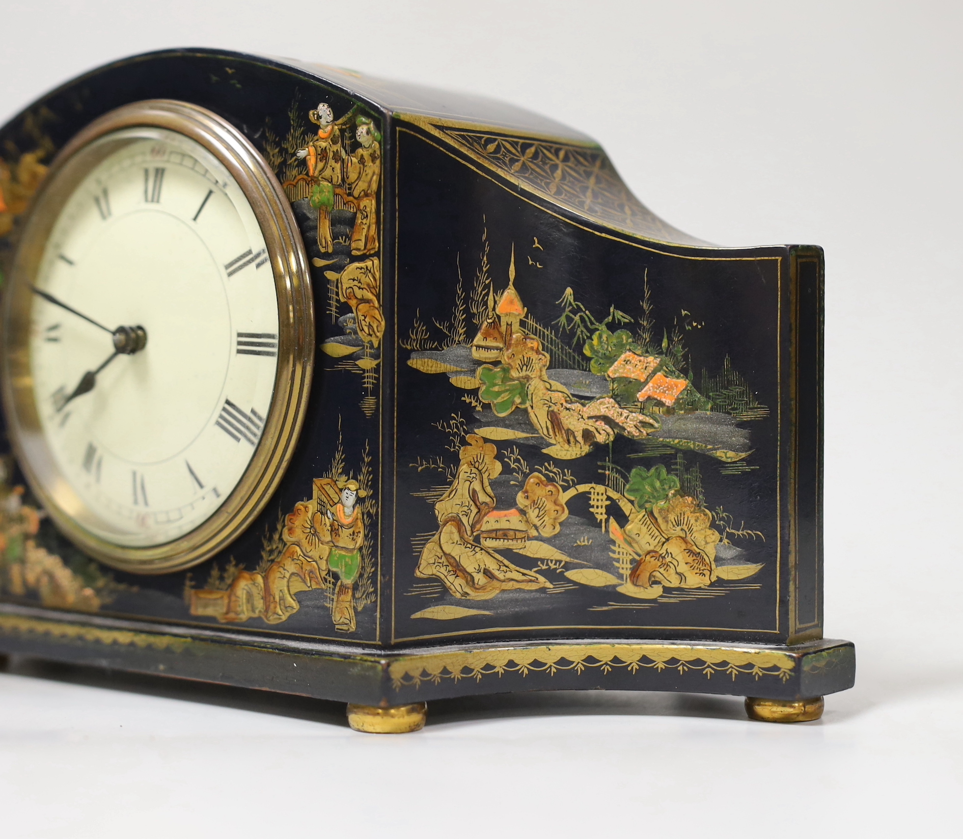 A French japanned mantel timepiece, 26cm wide